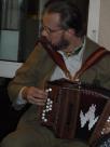 Guy playing his melodeon